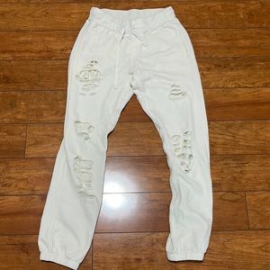 White ripped sweatpants. Size medium. Tags still on- never work.
